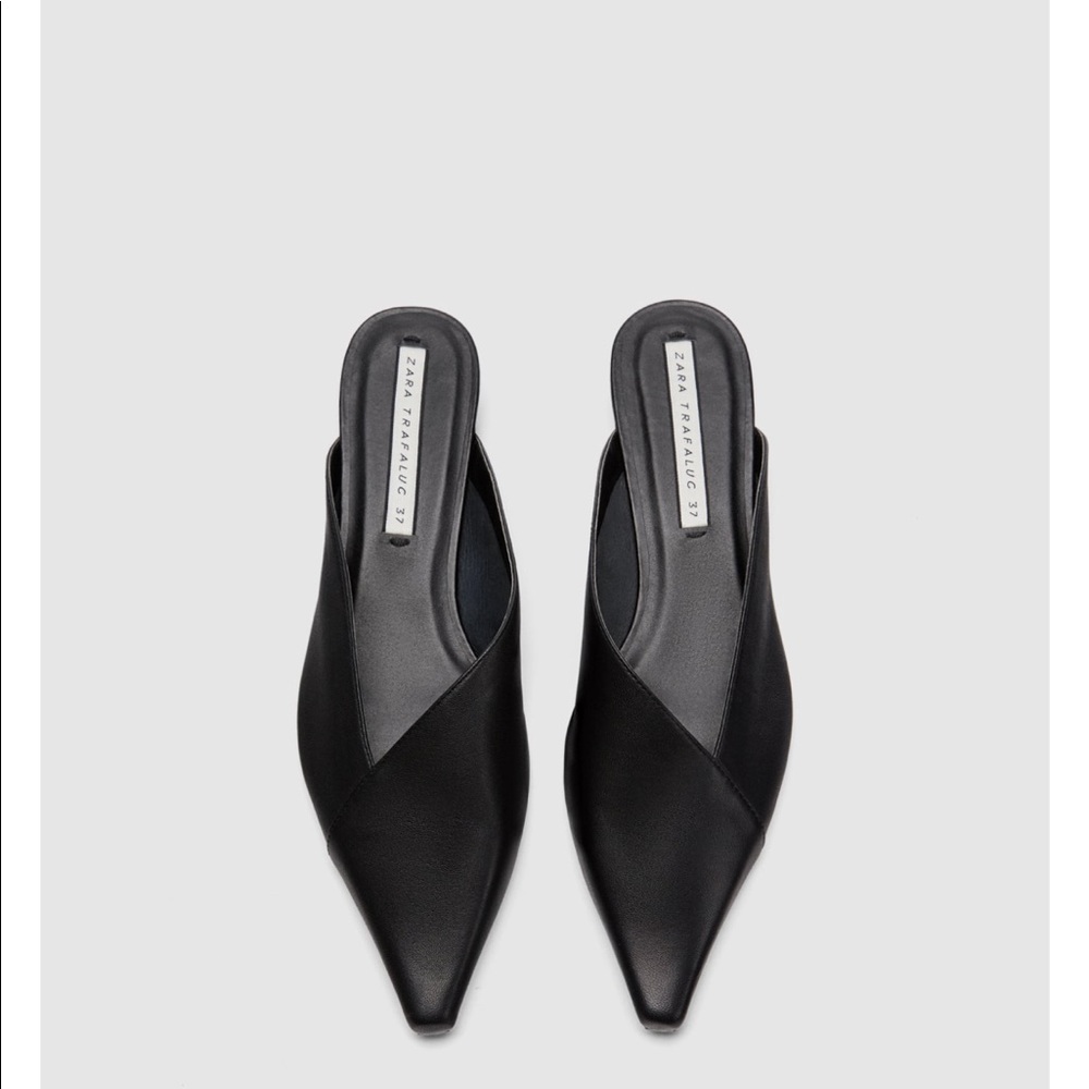 Black Goat skin mule in Asymmetric shaped heel